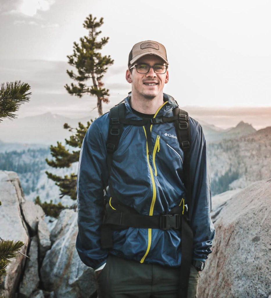 a person standing on a mountain