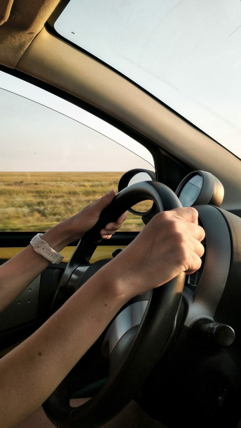 a person driving a car