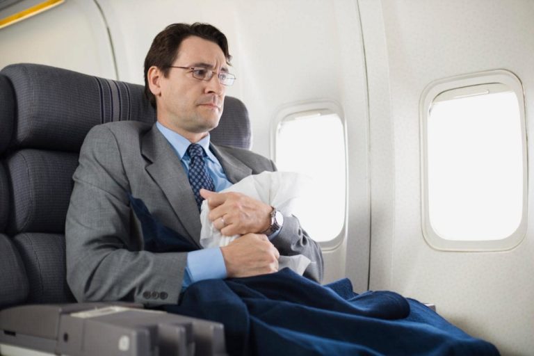 a man sitting in a plane